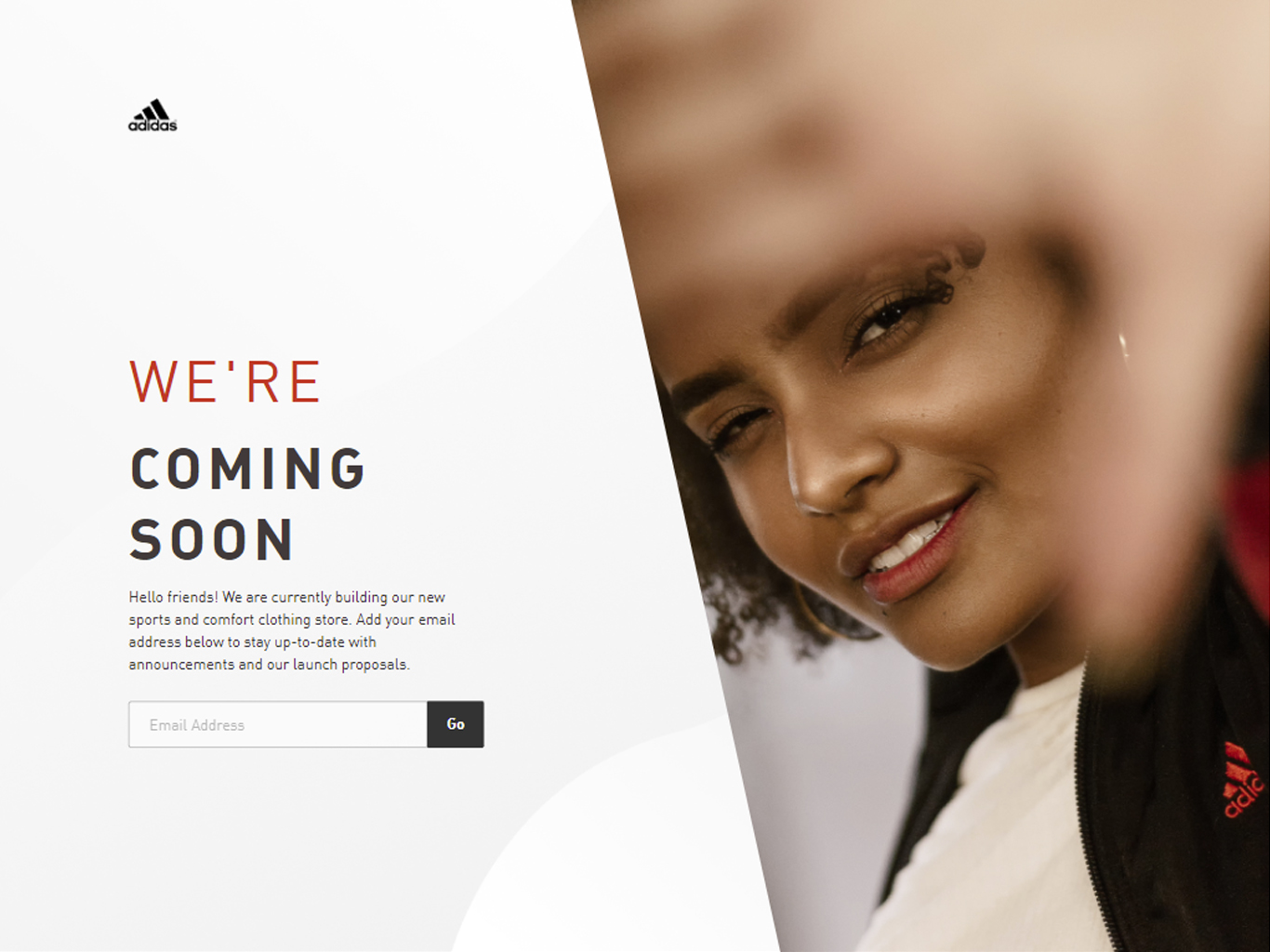 A webpage display for an upcoming Adidas store; there is a woman in an Adidas jacket holding her hand out and smiling.